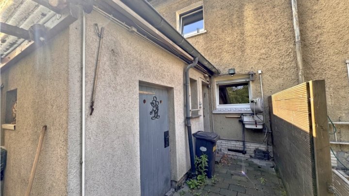 VERKAUFT !!!!DU- Süd kleines Reihenhaus mit schönem Garten für den Handwerker